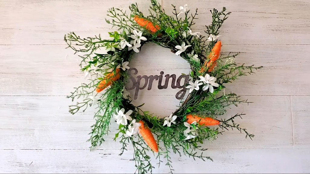 Stiligt påskpynt med kvistar och morötter